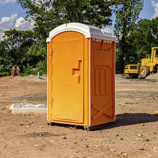 what is the cost difference between standard and deluxe portable restroom rentals in Gentry